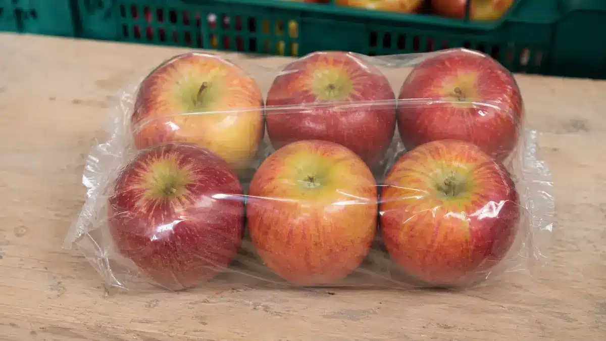 Several apples grouped in a clear unbranded retail shrink multipack