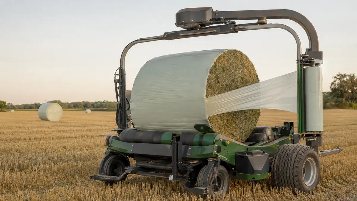 Concept illustration of stretch film being applied to a round forage bale