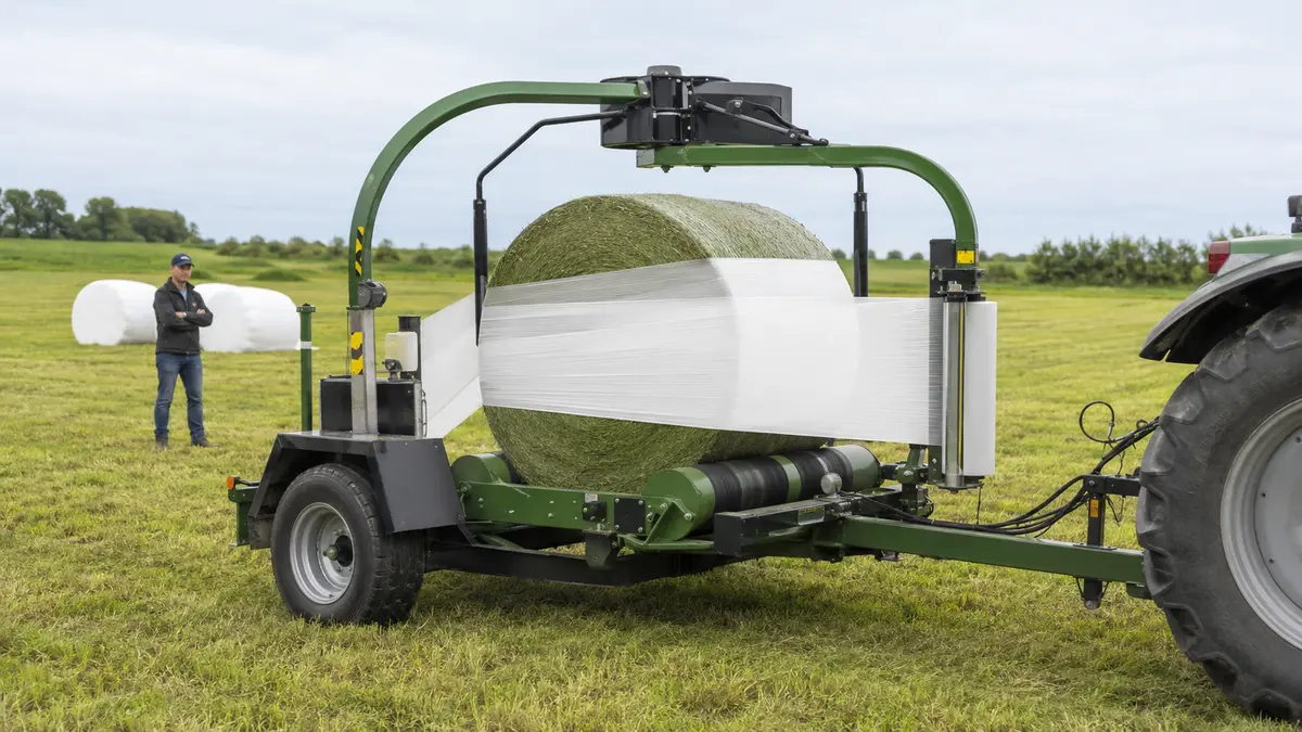 Generic agricultural wrapper applying stretch film to a round silage bale